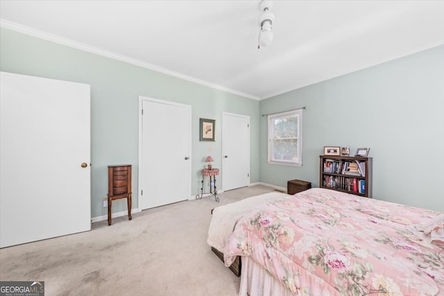 carpeted bedroom featuring ornamental molding