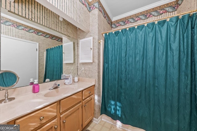 bathroom featuring vanity and crown molding