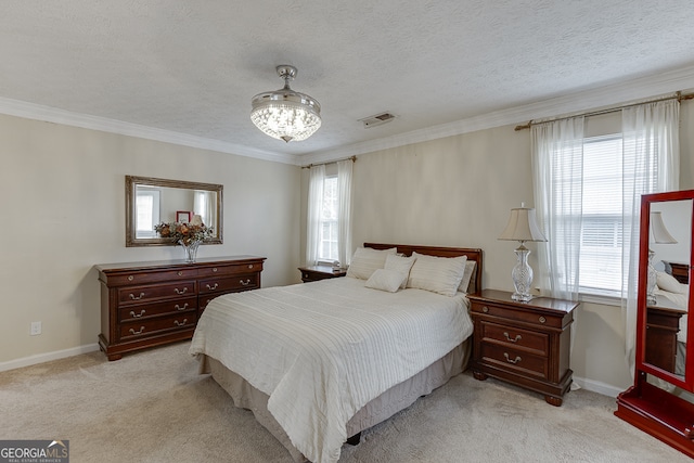 carpeted bedroom featuring a textured ceiling and crown molding