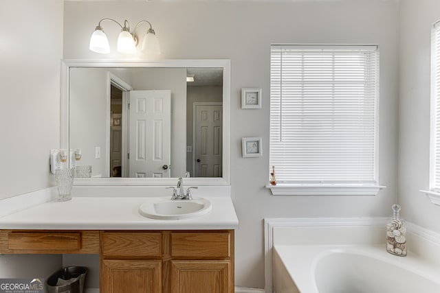 bathroom featuring a bathtub and vanity