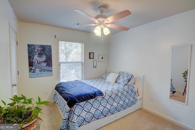 bedroom featuring carpet and ceiling fan