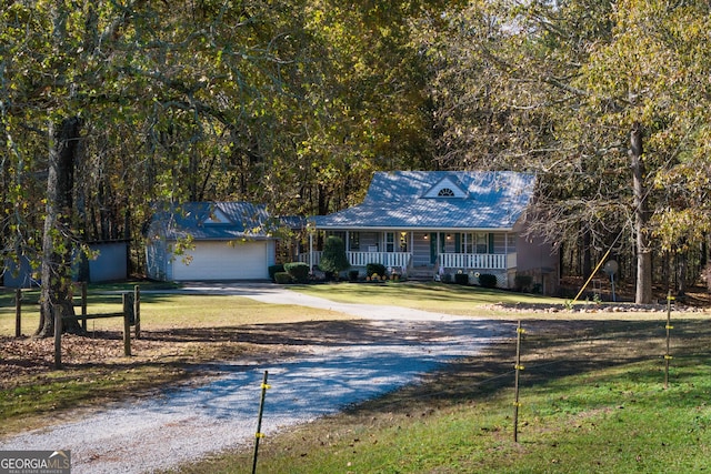 view of front of property featuring a front yard and covered porch