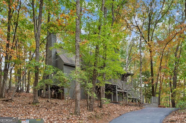 view of side of home featuring a deck