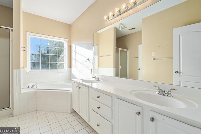 bathroom featuring tile patterned floors, vanity, and independent shower and bath