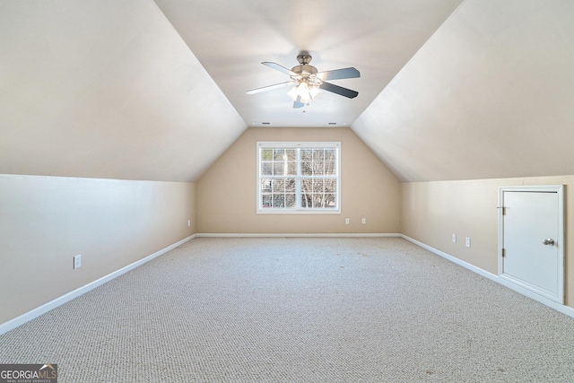 bonus room featuring ceiling fan, light colored carpet, and vaulted ceiling