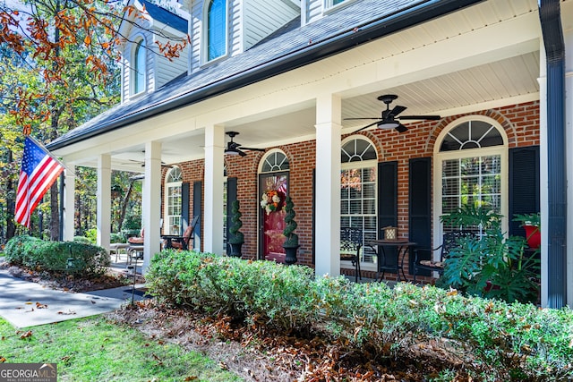 property entrance with a porch and ceiling fan