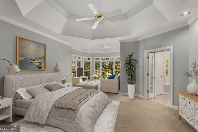 bedroom featuring a raised ceiling, crown molding, ceiling fan, and light colored carpet