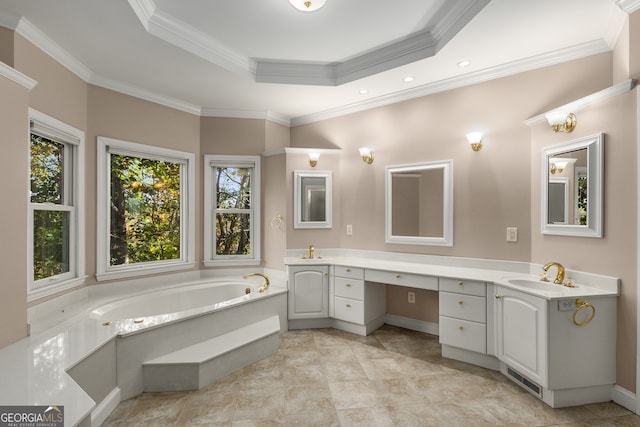 bathroom with a tub to relax in, crown molding, a tray ceiling, and vanity