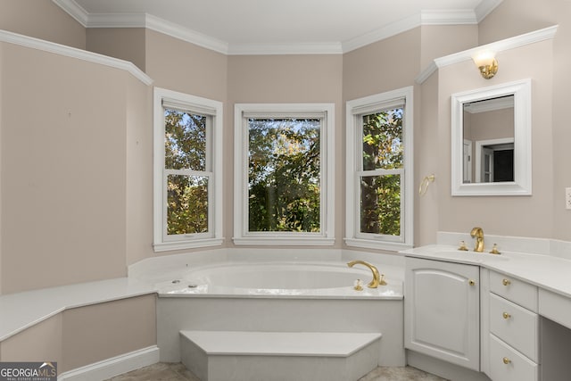 bathroom with plenty of natural light, ornamental molding, a tub, and vanity