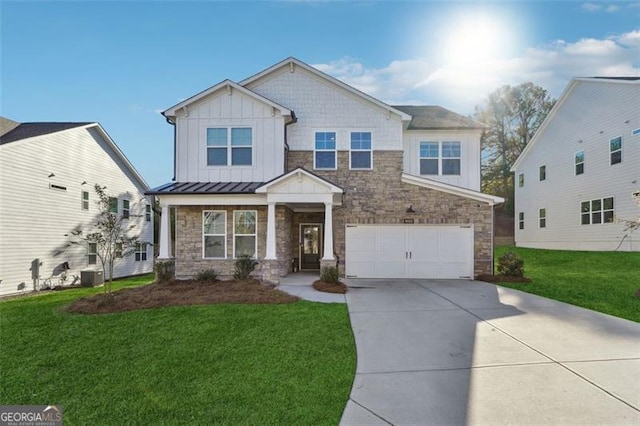 craftsman-style home with a front lawn, central air condition unit, and a garage