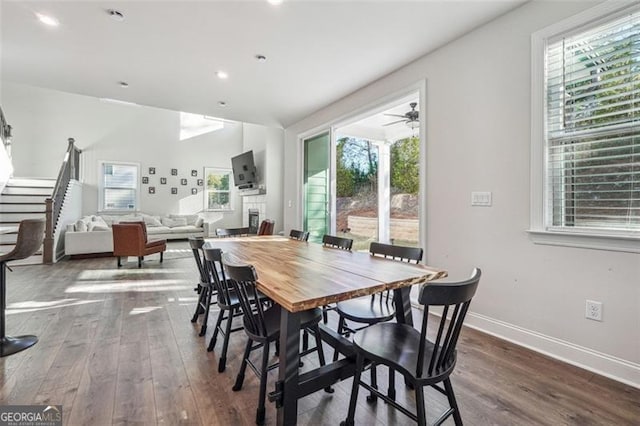 dining area featuring hardwood / wood-style flooring and ceiling fan