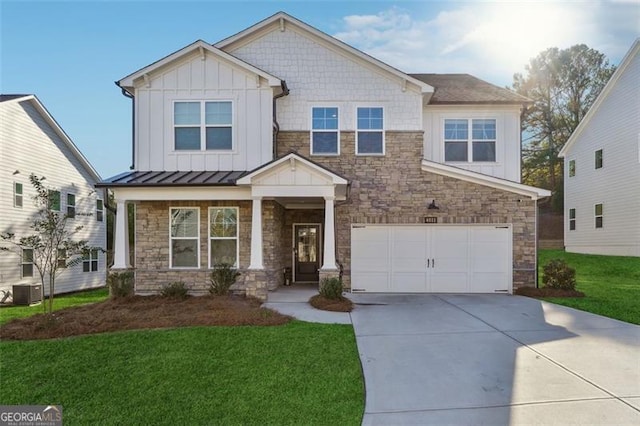 craftsman-style home with a garage, central AC unit, and a front yard