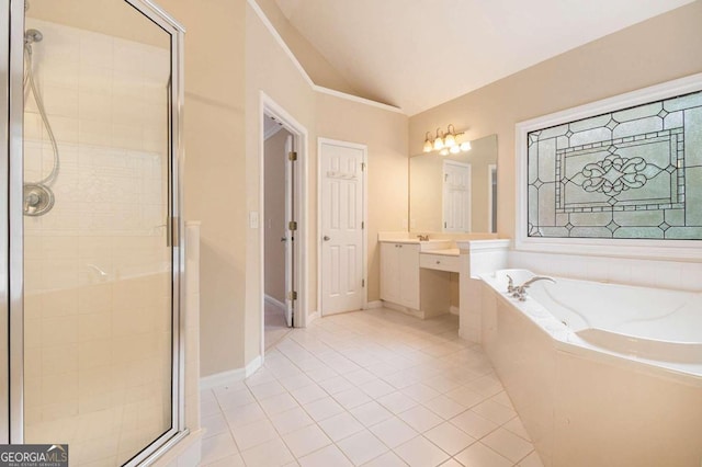 bathroom featuring tile patterned flooring, vanity, shower with separate bathtub, and vaulted ceiling