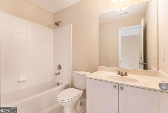 full bathroom featuring tile patterned floors, vanity, toilet, and shower / bathtub combination