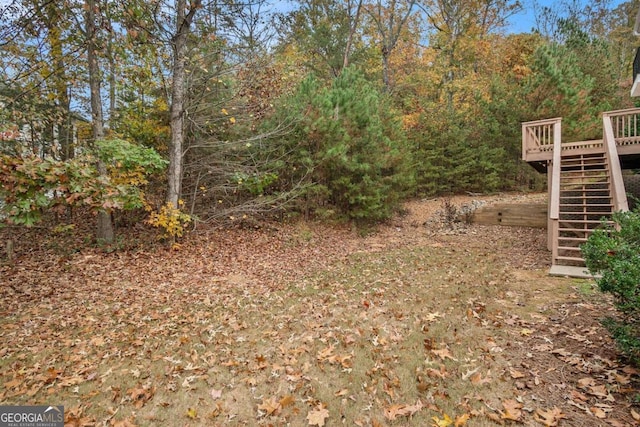 view of yard featuring a deck