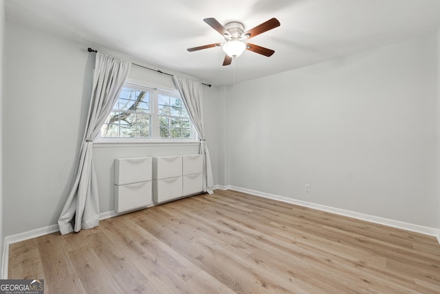 interior space featuring ceiling fan and light wood-type flooring