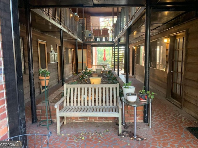 view of patio / terrace featuring a balcony