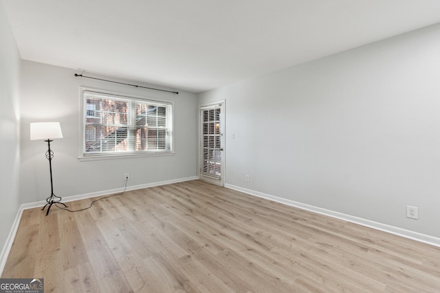 empty room with light wood-type flooring