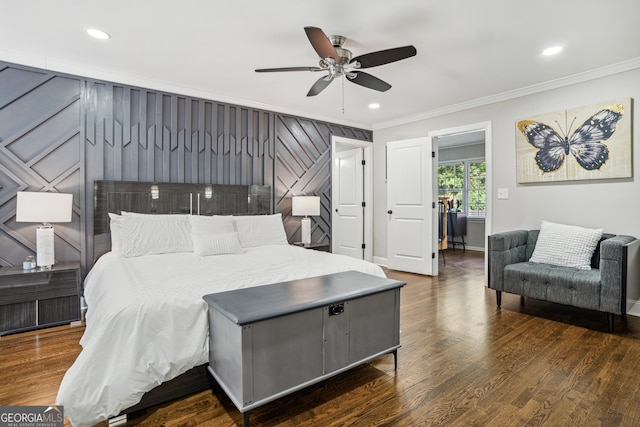 bedroom featuring crown molding, ceiling fan, and dark wood-type flooring