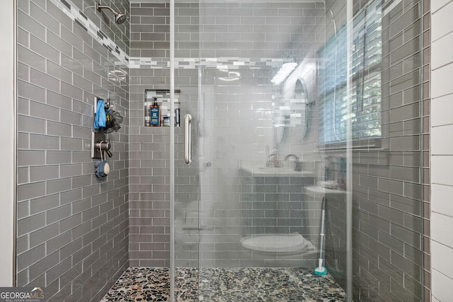 bathroom with an enclosed shower