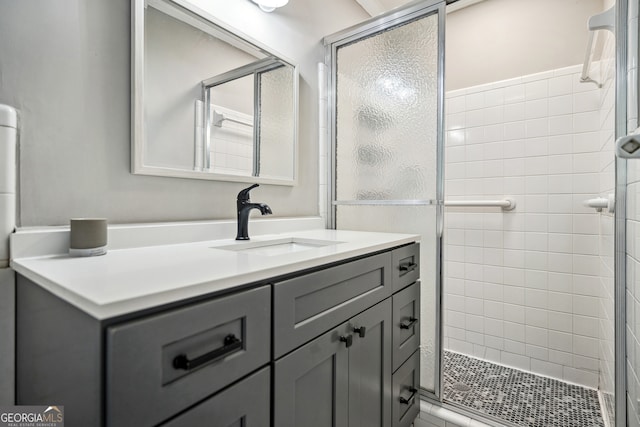 bathroom featuring vanity and walk in shower