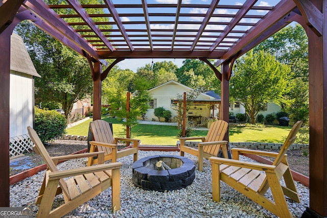 view of patio with a pergola and an outdoor fire pit