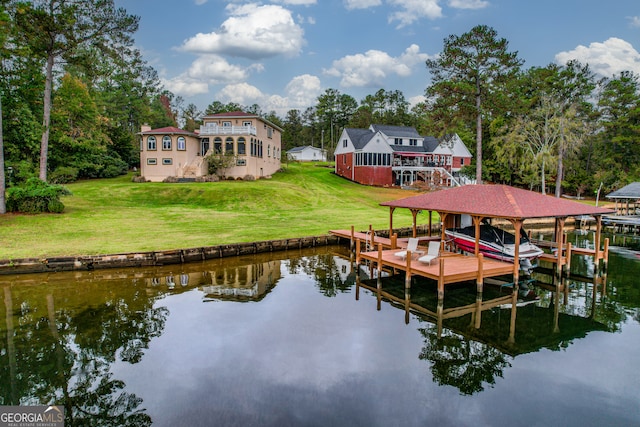 view of dock featuring a water view and a lawn