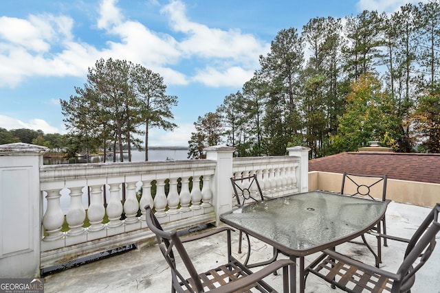 view of patio / terrace featuring a water view