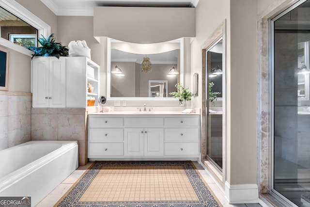 bathroom featuring vanity, independent shower and bath, tile walls, and ornamental molding