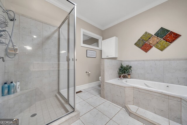 bathroom featuring shower with separate bathtub, toilet, and ornamental molding