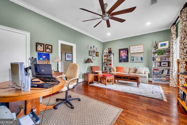 office with ornamental molding, ceiling fan, and hardwood / wood-style flooring