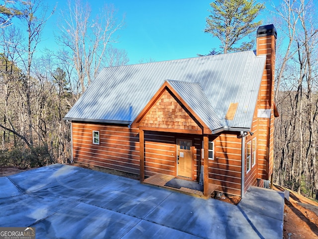 view of log-style house