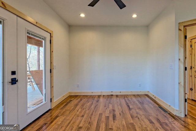 interior space featuring ceiling fan and wood-type flooring