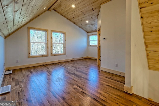 bonus room with hardwood / wood-style flooring, vaulted ceiling with beams, and wooden ceiling