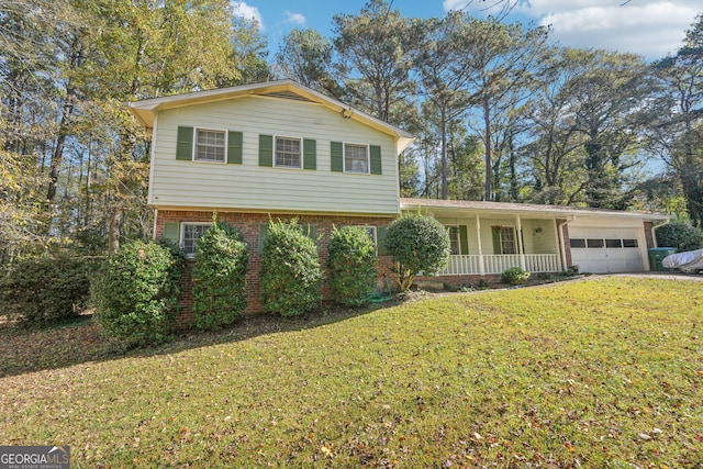 view of front facade featuring a porch, a garage, and a front lawn