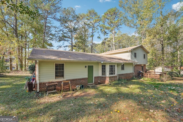 view of front of home with a front yard