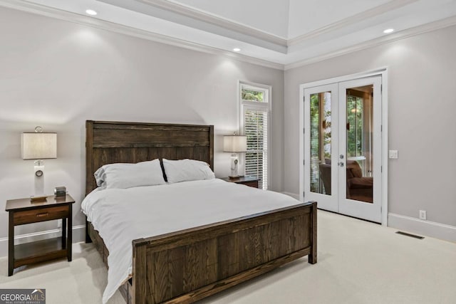 carpeted bedroom with access to outside, french doors, and ornamental molding