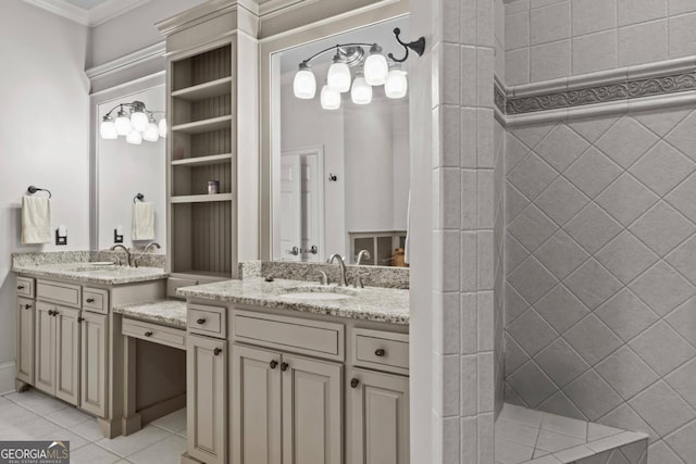 bathroom with vanity, a tile shower, ornamental molding, and tile patterned floors