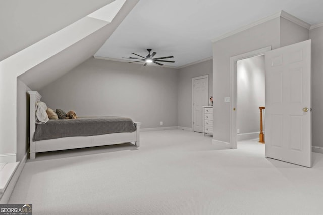 bedroom featuring vaulted ceiling, ornamental molding, ceiling fan, and light carpet