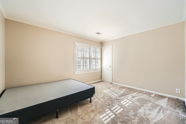 carpeted bedroom with crown molding