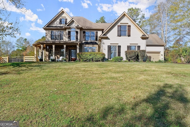 view of front of property featuring a front yard