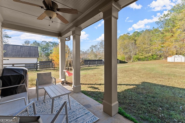 view of patio with ceiling fan and a grill