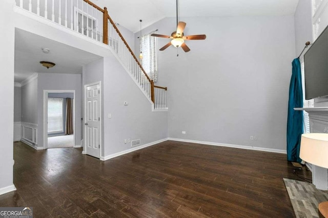 unfurnished living room featuring ceiling fan, high vaulted ceiling, and dark hardwood / wood-style floors