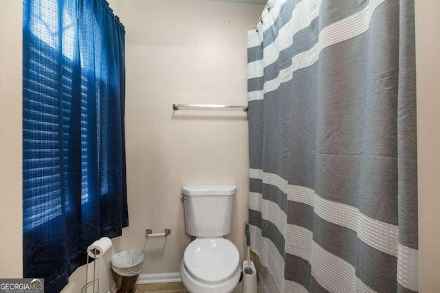 bathroom featuring toilet