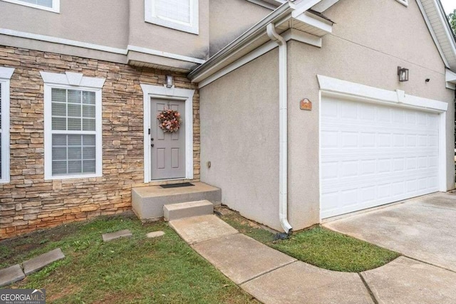 entrance to property with a garage