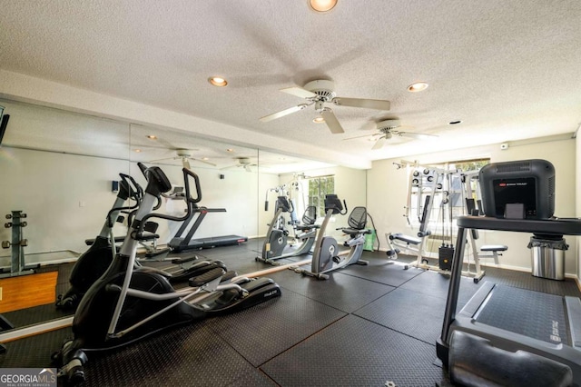 workout area featuring a textured ceiling and ceiling fan