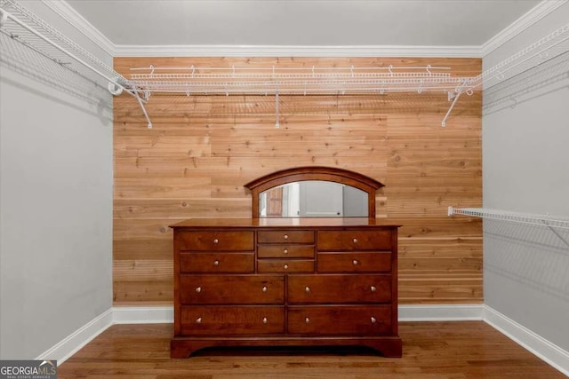 spacious closet featuring hardwood / wood-style floors