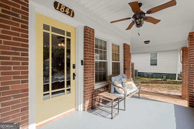 view of patio / terrace with ceiling fan and a porch