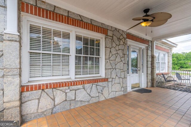 view of patio with ceiling fan