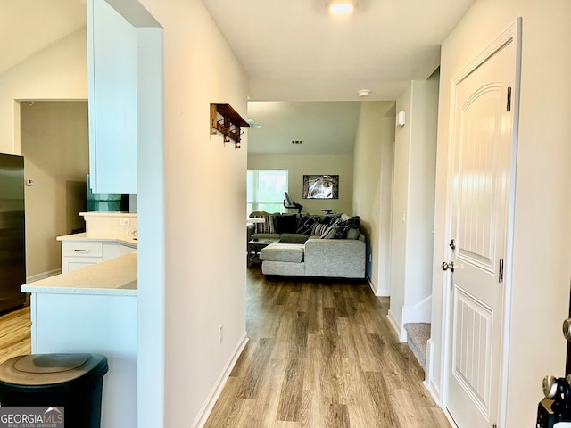 hallway featuring light wood-type flooring